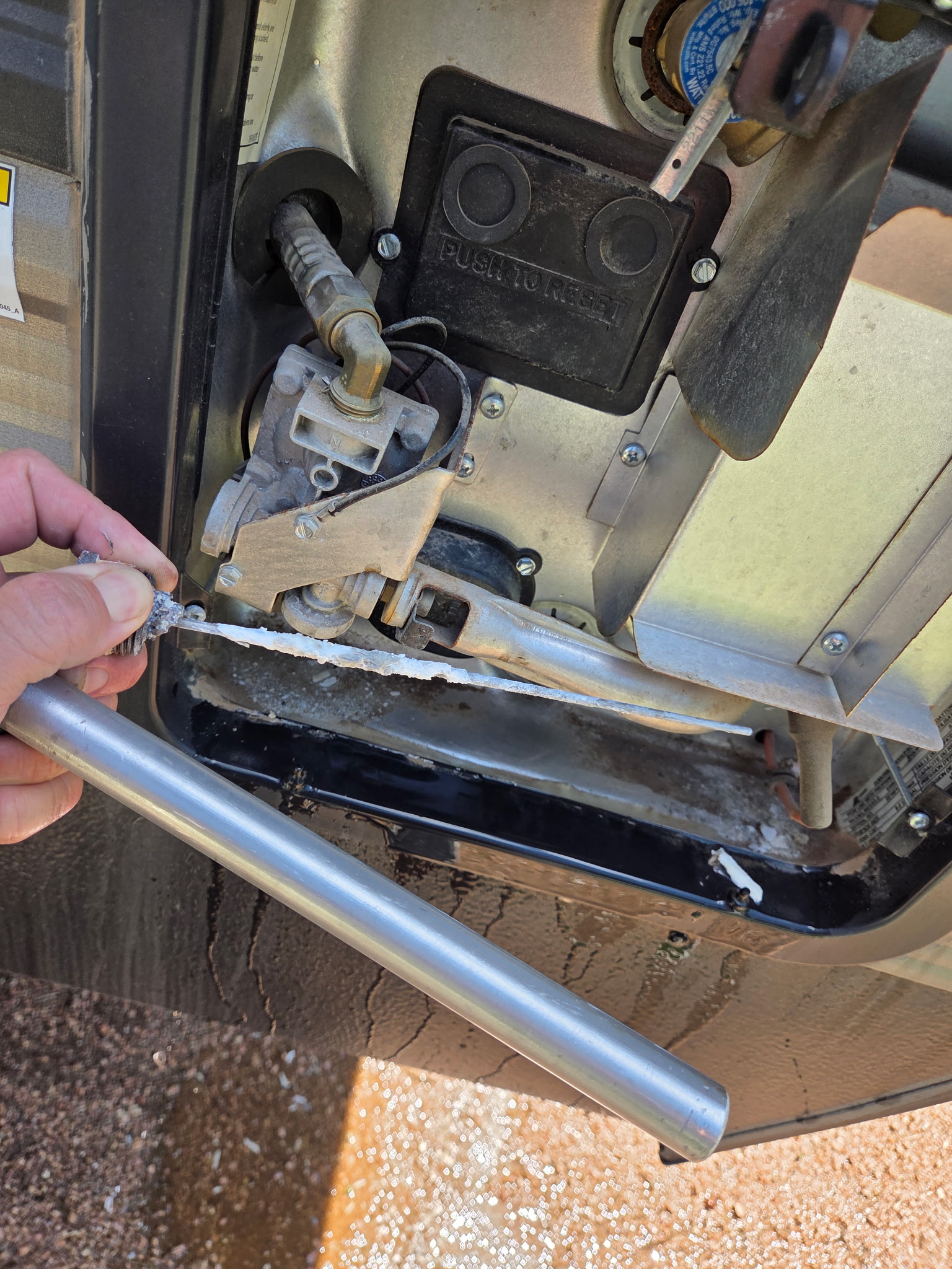 Water heater internals being serviced